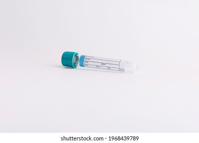 Vacuum Tube For Collection And Blood Samples On White Background.
Transparent With Blue Lid. Label To Identify The Data. Selective Focus. Lid. Label To Identify The Data. Selective Focus.