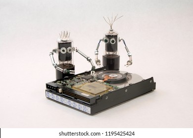 Vacuum Tube People Repair Computer Hard Drive. 