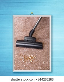 Vacuuming Carpet With Vacuum Cleaner. Dirt On The Rug. Housework Service. Close Up Of The Head Of A Sweeper Cleaning Device. Photo Frame On Wooden Rustic Wall.