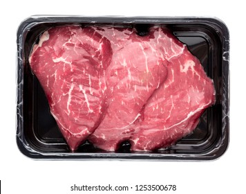 Vacuum-packed beef on a white background. Marbled beef from the store isolated on a white background.