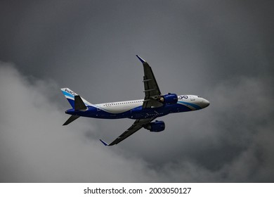 Vadodara, Gujarat, India - Jume 20, 2021: An Airbus A320 aircraft or airplane of Indigo Airlines taking off from an airport amid thunderstorm and overcast weather in Vadodara, Gujarat , India