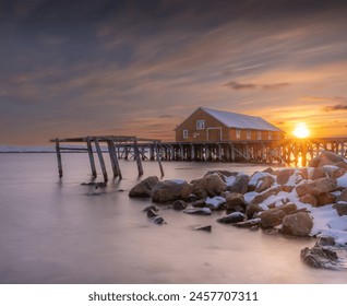 Vadsoe harbour, North Norway, Finnmark, Abandoned dock, sunset - Powered by Shutterstock