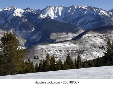 VAIL, CO - FEBRUARY 9: Skiers Ride A Chairlift At Vail Mountain In Vail, Colorado On February 9, 2015. Vail Mountain Is Located In The White River National Forest And Is Home Of The Vail Ski Resort.