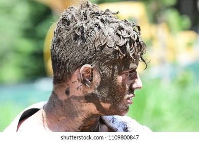 Vail, Colorado / USA - 06-09-18: GoPro Mountain Games Mud Run, Participants Running Through Mud Pits And Passed The Mud Stud