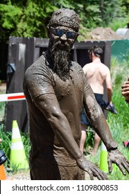 Vail, Colorado / USA - 06-09-18: GoPro Mountain Games Mud Run, Participants Running Through Mud Pits And Passed The Mud Stud