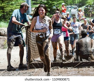 Vail, Colorado / USA - 06-09-18: GoPro Mountain Games Mud Run, Participants Running Through Mud Pits And Passed The Mud Stud