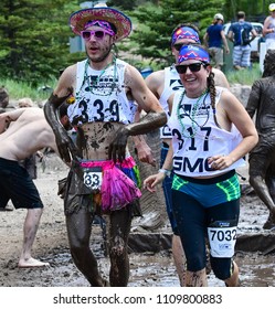 Vail, Colorado / USA - 06-09-18: GoPro Mountain Games Mud Run, Participants Running Through Mud Pits And Passed The Mud Stud