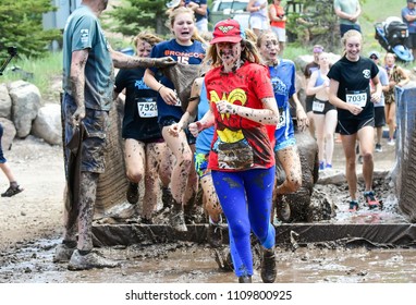 Vail, Colorado / USA - 06-09-18: GoPro Mountain Games Mud Run, Participants Running Through Mud Pits And Passed The Mud Stud