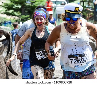 Vail, Colorado / USA - 06-09-18: GoPro Mountain Games Mud Run, Participants Running Through Mud Pits And Passed The Mud Stud