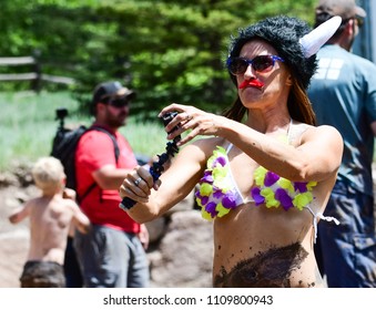 Vail, Colorado / USA - 06-09-18: GoPro Mountain Games Mud Run, Participants Running Through Mud Pits And Passed The Mud Stud