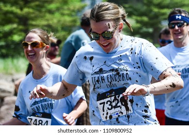 Vail, Colorado / USA - 06-09-18: GoPro Mountain Games Mud Run, Participants Running Through Mud Pits And Passed The Mud Stud