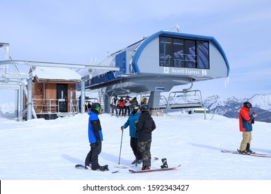 Vail, Colorado / USA December 15, 2019:  People Skiing And Getting Off Of The Avanti Chairlift At The Top Of Vail Mountain Ski Resort On A Cold, Winter Day In The Snow