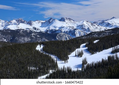 Vail downhill alpine ski runs in winter snow in the Colorado Rocky Mountains  - Shutterstock ID 1660475422