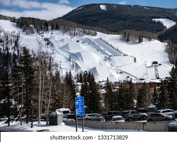 Vail,Colorado USA - Feb 23, 2019: Ski And Snowboard Terrain Park At Vail Ski Resort With Half Pipe Jumps