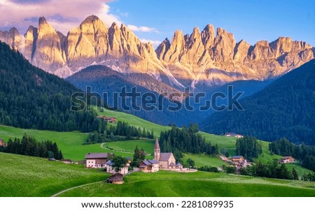Val di Funes, Dolomites, Italy. Santa Maddalena village in front of the Odle Geisler mountain group at sunset Italy