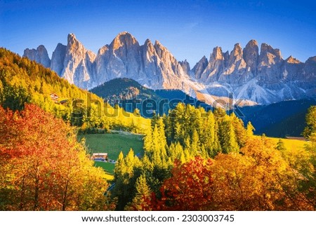 Val di Funes, Italy - Autumn scenic with Santa Magdalena village, idyllic Dolomites landscape in Funes Valley, South Tyrol, Italian Alps spotlight.