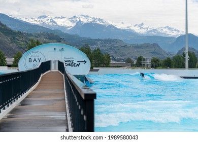 Valais, Sion, Switzerland - 9 June 2020: Surf Wave Pool In Switzerland. Alaia Bay And Wave Garden In Sion, French Part Of Switzerland. Surf In The Swiss Alps.