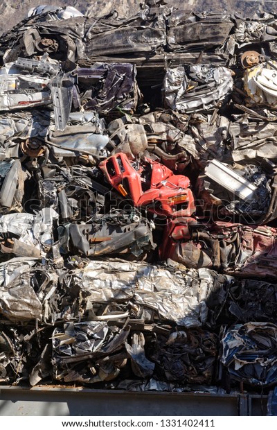 Valais, Switzerland, 26.02.2019, Recycling of\
old,used, wrecked cars. Dismantling for parts at scrap yards and\
sending for remelting