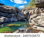 Vale da Lua, Chapada dos Veadeiros - rock formations with waterfall and natural pool