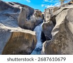 Vale da Lua, Chapada dos Veadeiros - rock formations with waterfall and natural pool