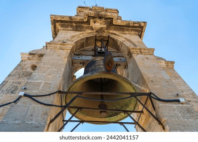 Valencia Cathedral, large bell on the Bell Tower, known as Miguelete Tower. The Gothic Cathedral in Valencia, Spain is also known as St Mary's Cathedral, a Roman Catholic church in Plaza de la Reina. - Powered by Shutterstock