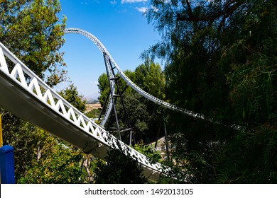 VALENCIA, CA/USA - AUGUST 08, 2019. Six Flags Magic Mountain. People Seeking Thrill Riding A Roller Coaster 