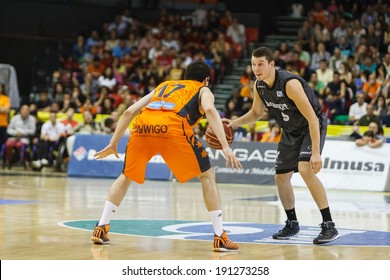 VALENCIA - MAY, 3: Bertans drives the ball during a Spanish league match between Valencia Basket Club and Bilbao at the Fonteta Stadium on May 3, 2014 in Valencia, Spain
