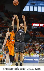 VALENCIA - MAY, 3: Outside shooting of Bertans #8 during a Spanish league match between Valencia Basket Club and Bilbao at the Fonteta Stadium on May 3, 2014 in Valencia, Spain