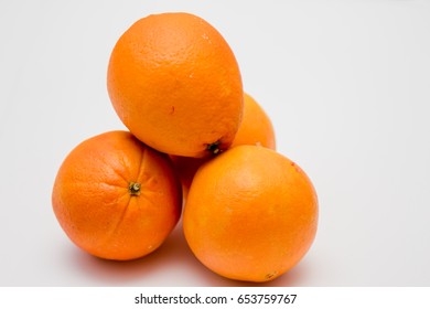 Valencia Oranges On White Background