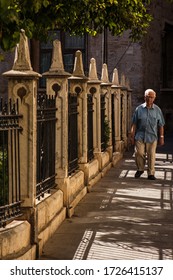 Valencia , Spain , 2019 , Older Man Walking Through The City Center