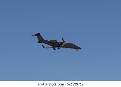 VALENCIA, SPAIN - APRIL 23, 2017: A Learjet 45 preparing to land at the Airport. The Learjet 45 aircraft is a mid-size business jet aircraft produced by the Learjet Division of Bombardier Aerospace.