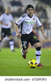 VALENCIA, SPAIN - DECEMBER 13 - Ever Banega In The Spanish Soccer League Match Between Valencia And Osasuna - Mestalla Stadium, Spain On December 13, 2010