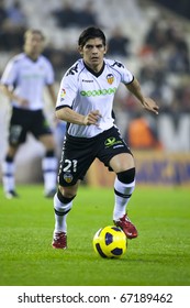 VALENCIA, SPAIN - DECEMBER 13 - Ever Banega In The Spanish Soccer League Match Between Valencia And Osasuna - Mestalla Stadium, Spain On December 13, 2010