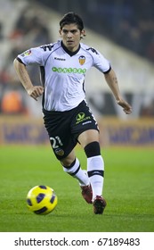 VALENCIA, SPAIN - DECEMBER 13 - Ever Banega In The Spanish Soccer League Match Between Valencia And Osasuna - Mestalla Stadium, Spain On December 13, 2010