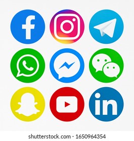 Valencia, Spain - February 16, 2020: Collection of popular social media logos printed on paper: Facebook, Instagram, Telegram, WhatsApp,Messenger, WeChat, Snapchat, YouTube, LInkedin.
