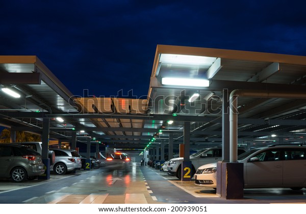 VALENCIA, SPAIN - JUNE 25, 2014: Inside the
parking garage at the Valencia airport.  Situated 8 km from the
city it is the 8th busiest Spanish airport with flight connections
to 15 European
countries.