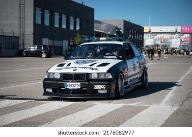 Valencia, Spain; June 4, 2022: Police Pursuit Car BMW E36 Patrolling In A Concentration