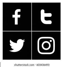 Valencia, Spain - March 15, 2017: Collection of popular social media logos printed on paper: Facebook, Twitter,  Instagram.