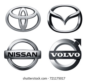 Valencia, Spain - March 27, 2017: Collection of popular car logos printed on white paper: Toyota, Mazda, Volvo, Nissan. 