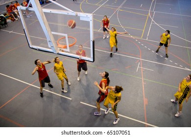 VALENCIA, SPAIN - NOV 14:  Women Basketball Teams, National & Technical University Of Athens (yellow) Plays The University Of Crete In The EuroValencia Games On November 14, 2010 In Valencia, Spain.