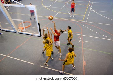 VALENCIA, SPAIN - NOV 14:  Women Basketball Teams, National & Technical University Of Athens (yellow) Plays The University Of Crete In The EuroValencia Games On November 14, 2010 In Valencia, Spain.