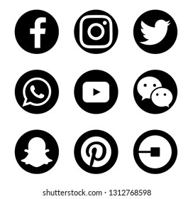Valencia, Spain - October 10, 2018: Collection of popular social media logos printed on paper: Facebook, Instagram, Twitter, WhatsApp, YouTube, WeChat, Snapchat, Pinterest, Uber