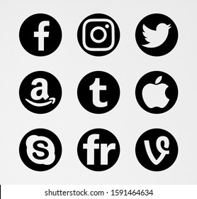 Valencia, Spain - October 10, 2018: Collection of popular social media logos printed on paper: Facebook, Instagram, Twitter, Amazon, Apple, Tumblr, Skype, Flickr, Vine.