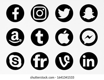 Valencia, Spain - October 10, 2019: Collection of popular social media logos printed on paper: Facebook, Instagram, Twitter, Snapchat, Amazon, Apple, Tumblr, Messenger, Skype, Flickr, Vine, LInkedin. 