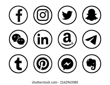 Valencia, Spain - October 10, 2020: Photo. Social media logos printed on paper: Facebook, Instagram, Twitter, Snapchat, WeChat, LInkedin, Telegram, Amazon, Tumblr, Pinterest, Messenger, Evernote.