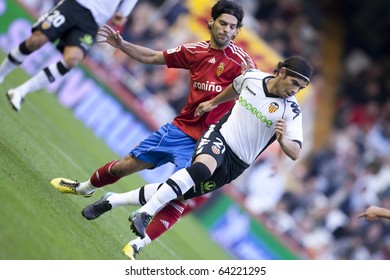 VALENCIA, SPAIN - OCTOBER 30 - #21 Ever Banega In The Spanish Soccer League Match Between Valencia And Zaragoza - Mestalla Stadium, Spain On October 30, 2010