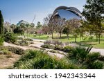 Valencia, Spain: partial view of the Jardí del Túria (Túria gardens), a public park with cycle ways, footpaths, sports facilities as well as the futuristic City of Arts and Sciences in the background