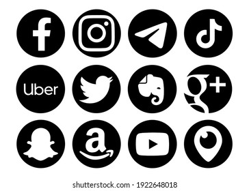 Valencia, Spain - September 13, 2020: Social media logos printed on paper: Facebook, Instagram, Telegram, Tiktok, Uber, Twitter, Evernote, Google Plus, Snapchat, Amazon, YouTube, Periscope.