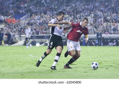 VALENCIA, SPAIN - SEPTEMBER 29, UEFA Champions League, Valencia C.F. Vs Manchester United, Mestalla Stadium, #4 David Navarro, Vidic, On September 29, 2010 In Valencia, Spain