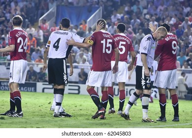 VALENCIA, SPAIN - SEPTEMBER 29, UEFA Champions League, Valencia C.F. Vs Manchester United, Mestalla Stadium, Navarro, Vidic, Ferdinand, On September 29, 2010 In Valencia, Spain